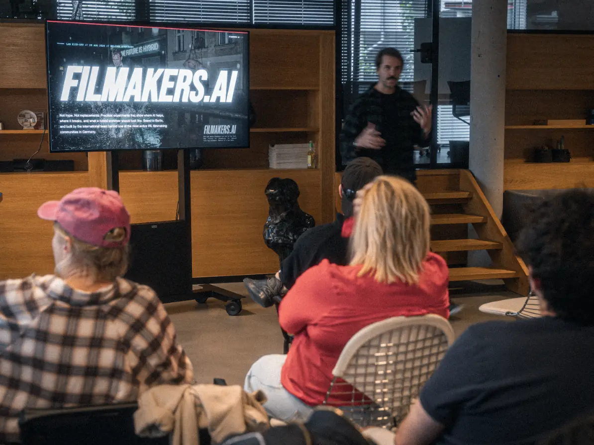 The audience watches the FILMAKERS.AI opening slide