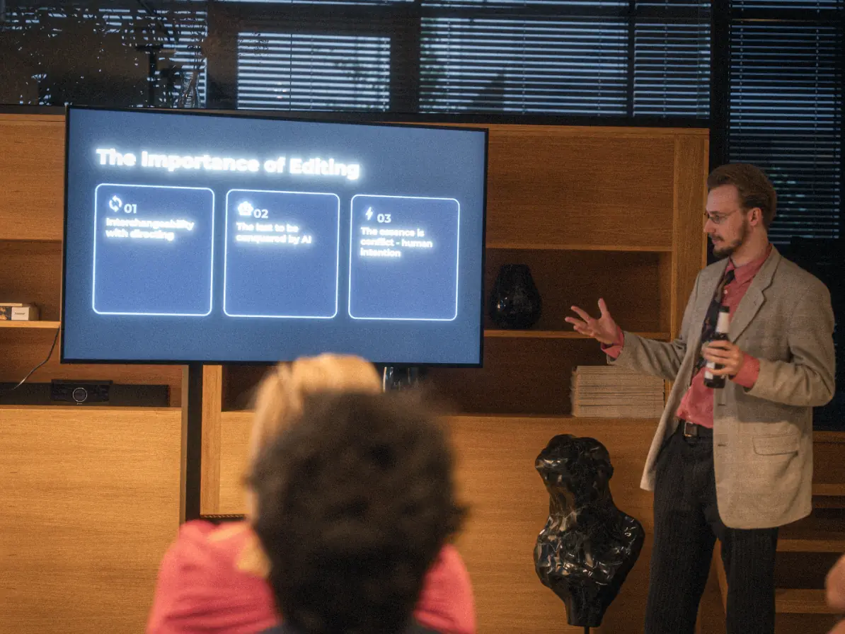 A speaker gives a talk titled The Importance of Editing